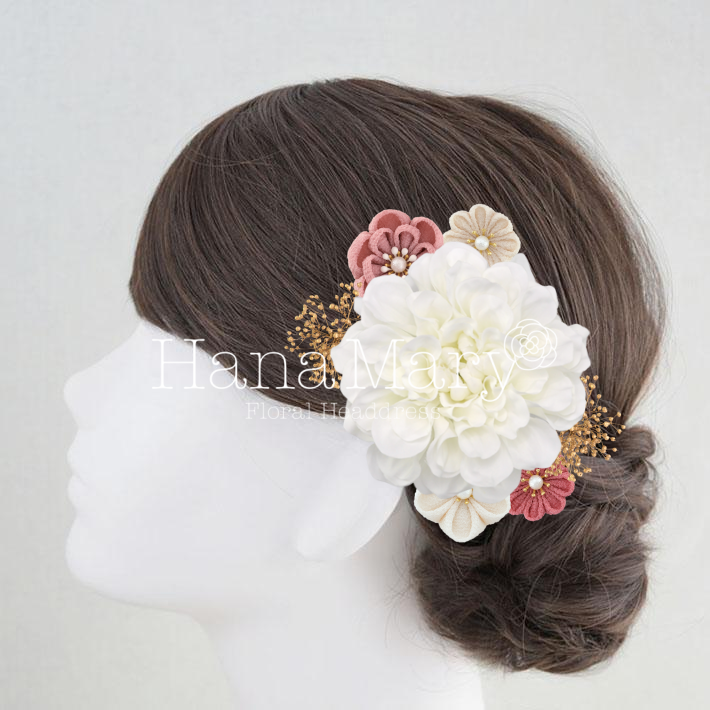 白とピンクと金の髪飾り