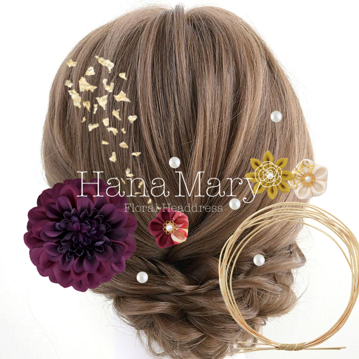 大きなジニアの紫髪飾り