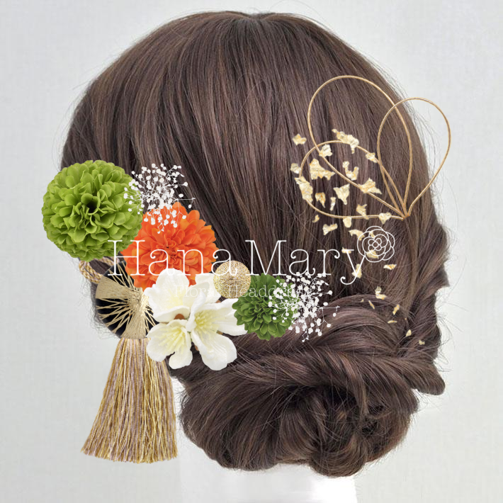 緑とオレンジの髪飾り